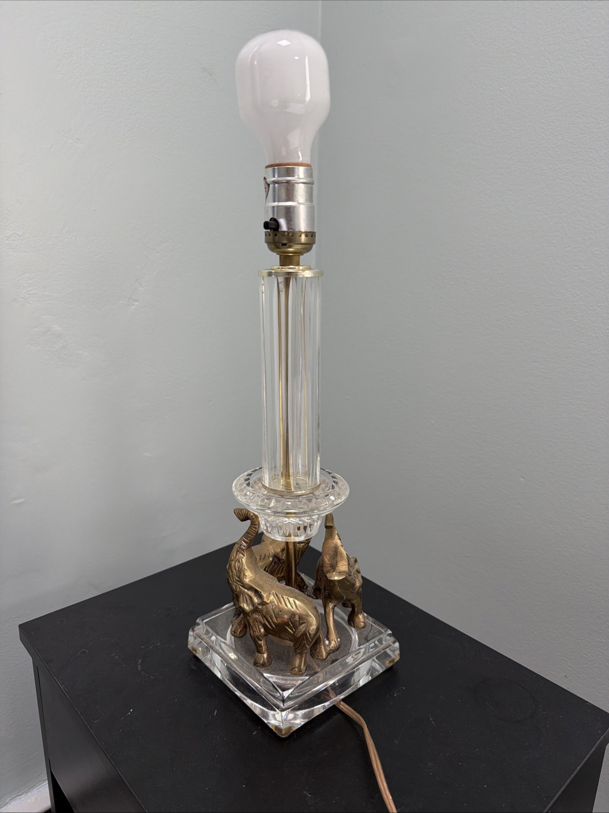 Vintage 1970s crystal and brass table lamp. Cluster of brass elephants Base