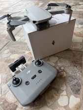 DJI Mini 2 SE Camera Drone (with Remote, Battery and Accessories Included) picture