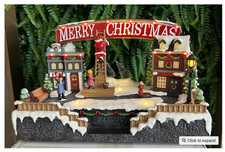 Christmas resin craft ornaments village square with LED lights Santa up and down picture