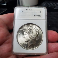 1923 Peace Dollar ANACS MS64 ~ Old ANA Soapbox Gold Genie Holder. RARE! picture
