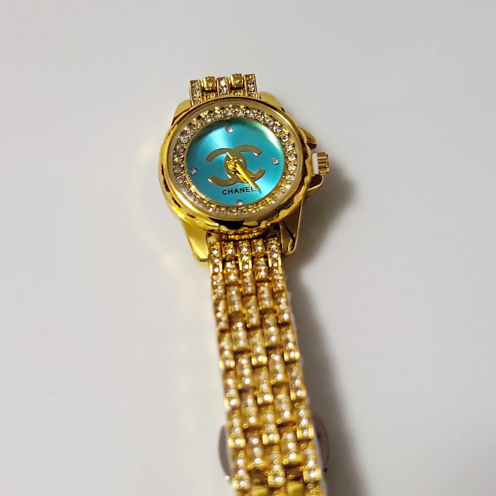 CHANEL Women's Quartz Analog Blue Dial Gold-Tone Bracelet Watch Gem-Set WR