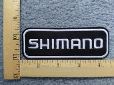 SHIMANO  FISHING TACKLE RODS AND REELS  FISHING  IRON ON PATCH  FREE SHIPPING  picture