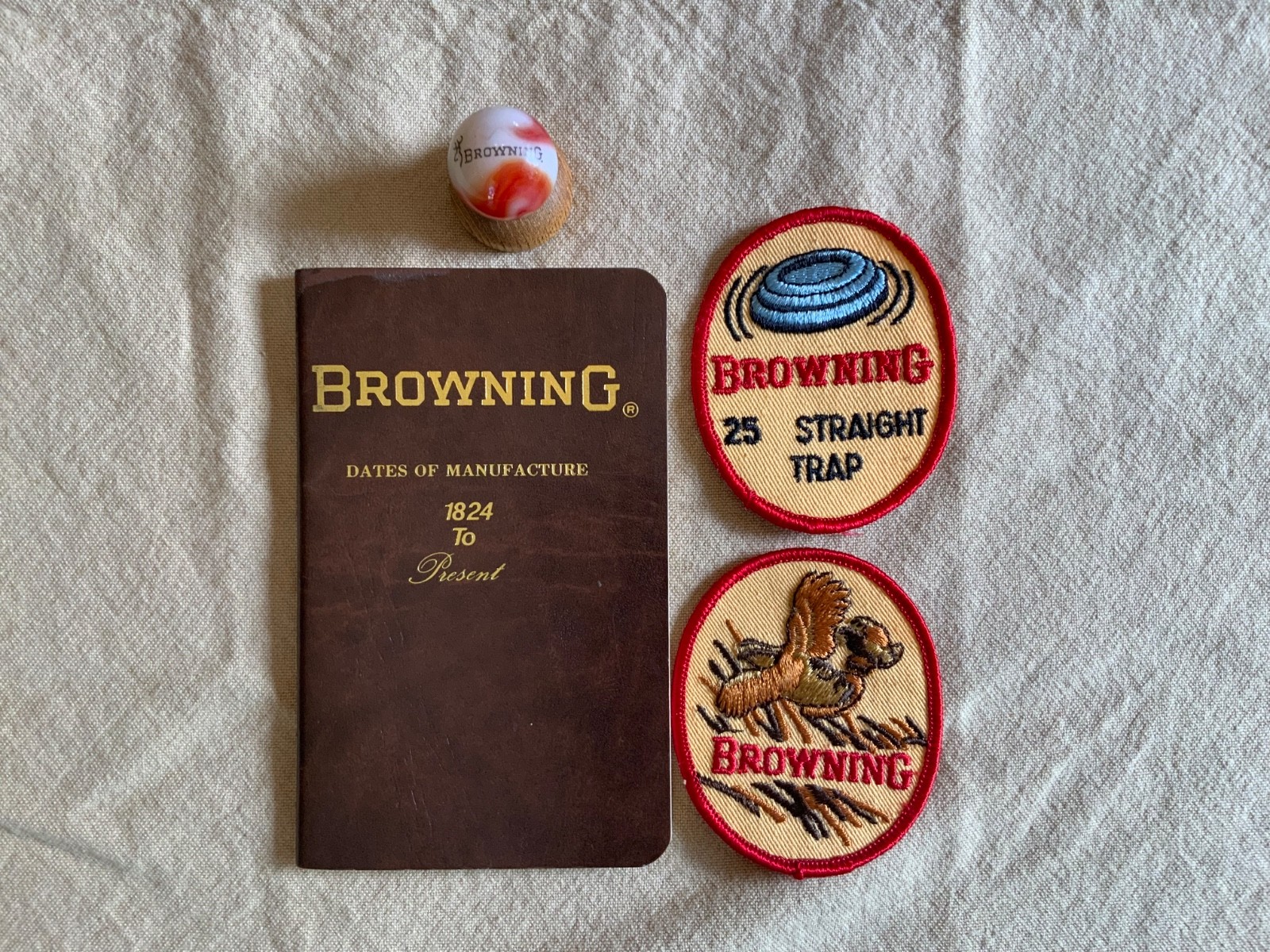 Browning Firearms collectibles -Browning signed book,  2 Patches,  Marble&holder