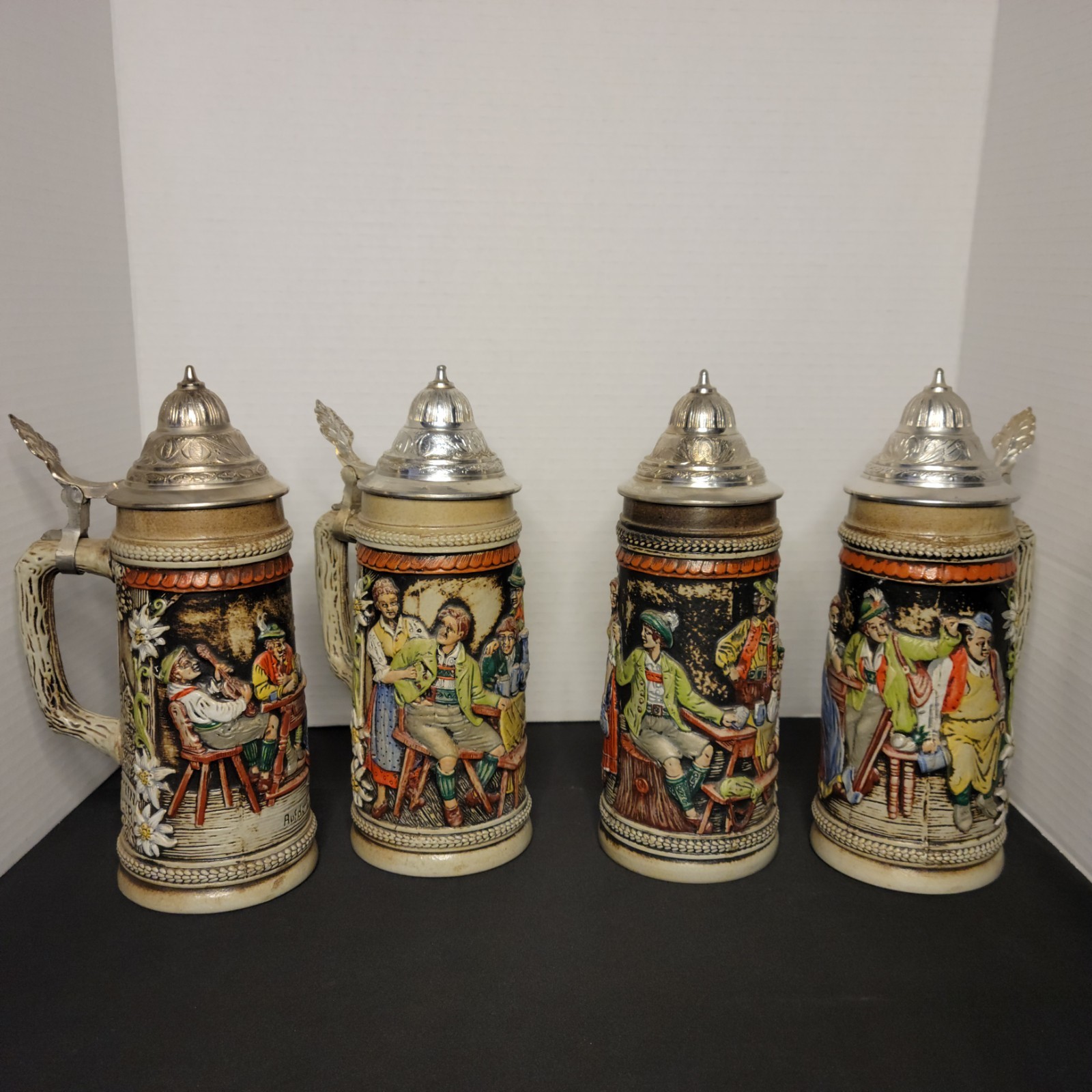 Vintage S.P. Gerz German Beer Steins Lot of 4 0.5L Pewter Lids Relief Germany Vintage S.P. Gerz German Beer Steins Lot of 4 0.5L Pewter Lids Relief Germany