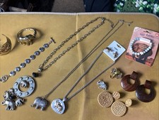 Elephant lot gold and silver tone great condition picture