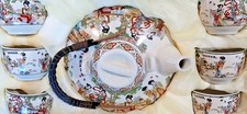 Oriental Porcelain Tea Service with Six  Cups and Strainer picture