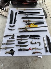 Personal collection of unsharpen swords, katanas daggers and collectible knifes picture
