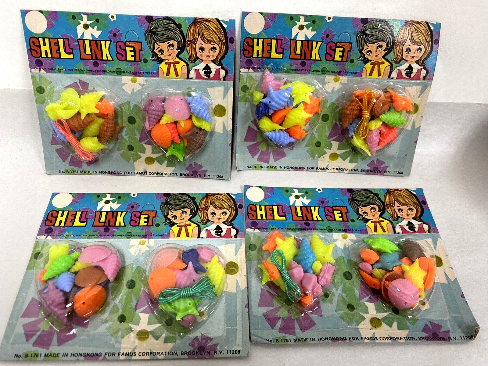 Four sets 1970s Vintage Plastic Shell Charms Hong Kong Famus Brooklyn NY Four sets 1970s Vintage Plastic Shell Charms Hong Kong Famus Brooklyn NY